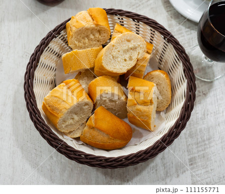 Sliced loaves of bread baguette 111155771