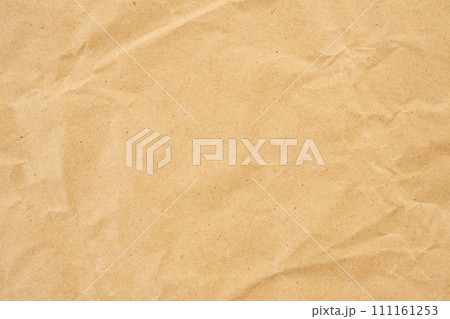 Abstract brown crumpled creased recycle paper texture background 111161253