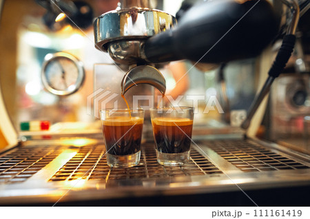 Coffee shot,Coffee machine pouring out espresso shot Coffee shot,Coffee machine pouring out espresso shot 111161419