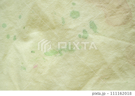 dirty color stain on yellow fabric texture background 111162018
