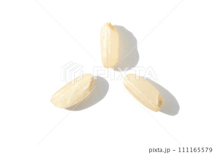 A top view captures the raw beauty of white basmati and brown rice grains. Macro A top view captures the raw beauty of white basmati and brown rice grains. Macro 111165579