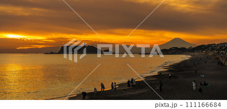 Scenery Kamakura Yuigahama Beach with Kamakura city and Fujisan mountain. Twilight silhouette Mount Fuji behind Enoshima island at Kamakura, Kanagawa, Japan. Landmark for tourist attraction near tokyo Scenery Kamakura Yuigahama Beach with Kamakura city and Fujisan mountain. Twilight silhouette Mount Fuji behind Enoshima island at Kamakura, Kanagawa, Japan. Landmark for tourist attraction near tokyo 111166684
