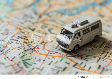 Small van car model on the map paper, concept travel, road trip, Planning the route to fun 111166907