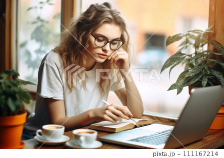 A photography of young woman work on computer at daytime A photography of young woman work on computer at daytime 111167214