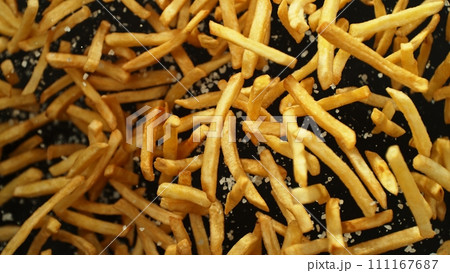 Flying French Fries up in the Air. Fast Food Concept with Flying Food. 111167687