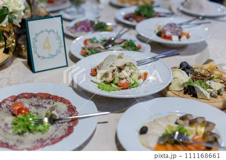 food at a wedding party in a restaurant with decor food at a wedding party in a restaurant with decor 111168661