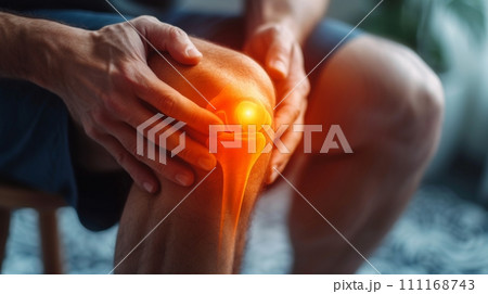 Man sitting down with knee pain Man sitting down with knee pain 111168743