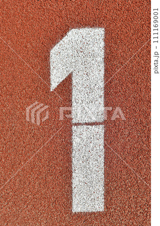 Number one on a red runway is numbered at a stadium Number one on a red runway is numbered at a stadium 111169001