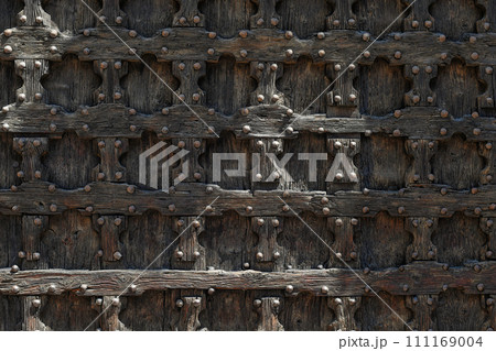 Wooden door with ancient square patten Wooden door with ancient square patten 111169004