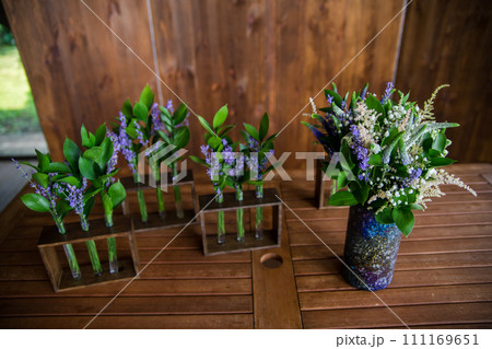 decor of flowers on a table in a restaurant 111169651