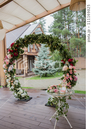 arch for a wedding ceremony of flowers decor 111169825