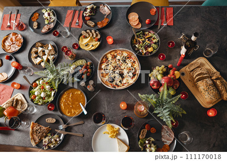 Top view of brunch table with tasty delicious food and beverages ready for holiday home dinner 111170018