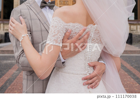 bride and groom in summer park together bride and groom in summer park together 111170038