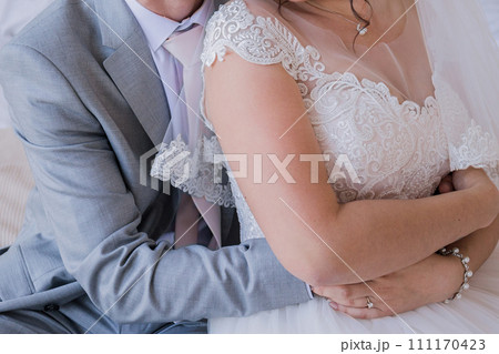 bride and groom in a room together bride and groom in a room together 111170423