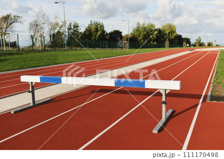 Empty stadium with barrier obstacle Empty stadium with barrier obstacle 111170498