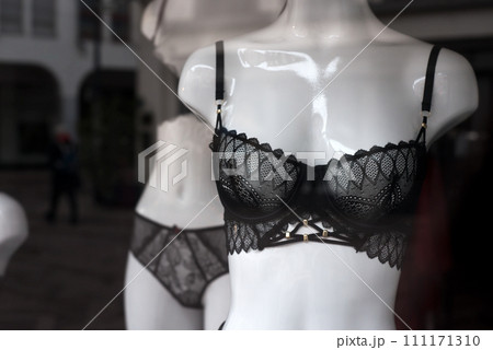 Closeup of black bra on mannequin in a fashion store showroom 111171310
