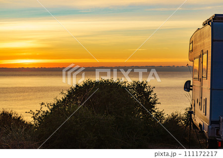 Caravan on nature in the morning at sunrise 111172217