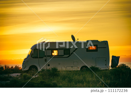 Caravan on nature in the morning at sunrise Caravan on nature in the morning at sunrise 111172236