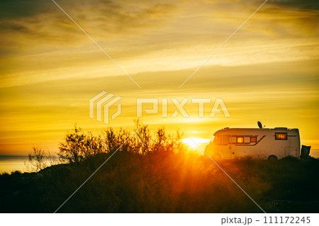 Caravan on sea at sunrise. Caravan on sea at sunrise. 111172245