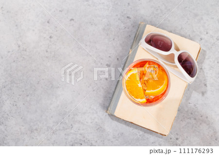 Refreshing cocktail by the pool on a sunny day Refreshing cocktail by the pool on a sunny day 111176293