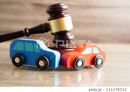 Car accident lawsuit and insurance, Judge hammer with car model. 111176512