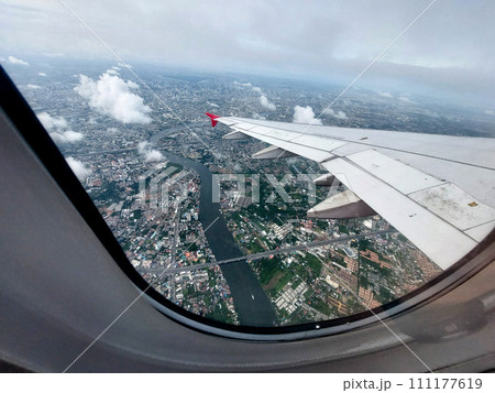 plane flying over the bangkok plane flying over the bangkok 111177619