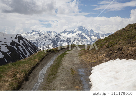 View on the mountains with snow on the Furka Pass in Switzerland View on the mountains with snow on the Furka Pass in Switzerland 111179010