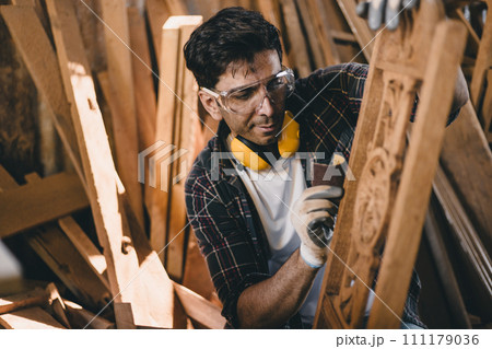 professional carpenter man hand working make wooden handcraft furniture master workpiece fine detail artisan with wood workshop. professional carpenter man hand working make wooden handcraft furniture master workpiece fine detail artisan with wood workshop. 111179036
