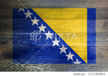 Bosnia Herzegovina flag on rustic old wood surface background 111180062
