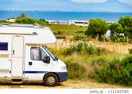 Caravans on sea coast, Spain Caravans on sea coast, Spain 111180560