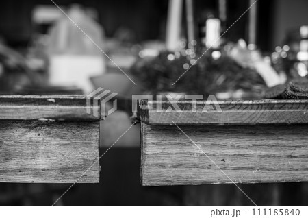 Gap in a kitchen table to add or remove sections. Gap in a kitchen table to add or remove sections. 111185840