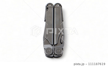Folded steel multitool isolated on white background, top view. A tool for daily practice. All in one. Construction and repair. Compact and portable product. Pocket knife. EDC concept 111187619