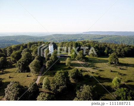 A white tower in a green park with a view of the horizon. Germany countryside A white tower in a green park with a view of the horizon. Germany countryside 111188721