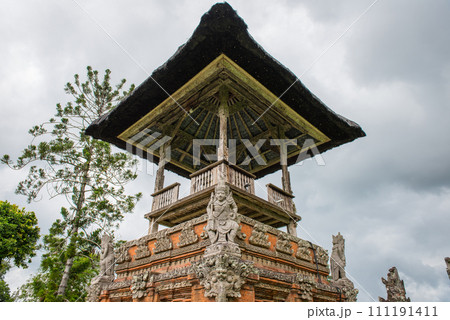 The spiritual shrine in Pura Taman Ayun the royal temple of Mengwi empire in Badung Regency, Bali, Indonesia. View in the Cloudy day. 111191411