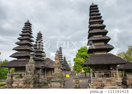 One of the popular temple in Bali named Pura Taman Ayun the royal temple of Mengwi empire in Badung Regency, Bali, Indonesia. View in the Cloudy day. 111191418