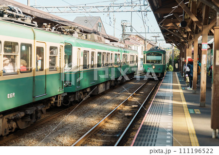 Enoshima Dentetsu train Line in Kamakura, Japanese railway connects Kamakura in Kamakura with Fujisawa Station in Fujisawa, Kanagawa. Landmark attraction near Tokyo. Kanagawa, Japan, 16 November 2023 111196522