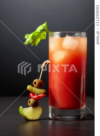 Cocktail Bloody Mary on a black background. 111200092