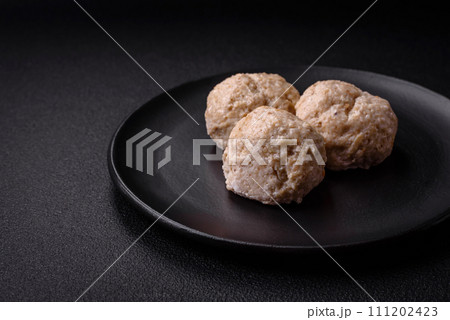 Delicious healthy steamed chicken cutlets or minced meatballs Delicious healthy steamed chicken cutlets or minced meatballs 111202423