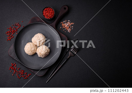 Delicious healthy steamed chicken cutlets or minced meatballs 111202443