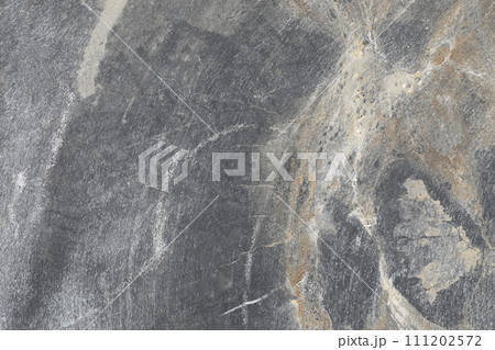 Rough stone texture with scratches. 111202572