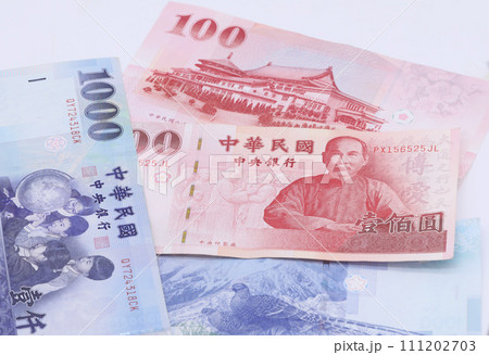 Taiwan dollar banknotes background 111202703