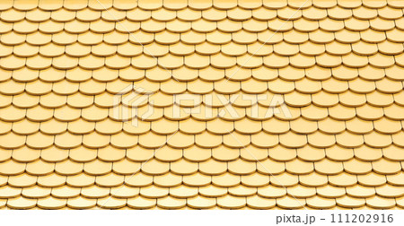 Yellow ceramic tiled roof pattern. 111202916
