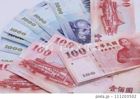 Taiwan dollar banknotes background 111203502