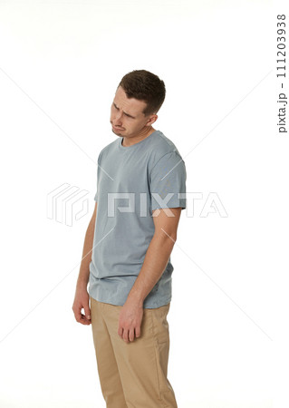 offended frustrated young man on white background. sadness offended frustrated young man on white background. sadness 111203938