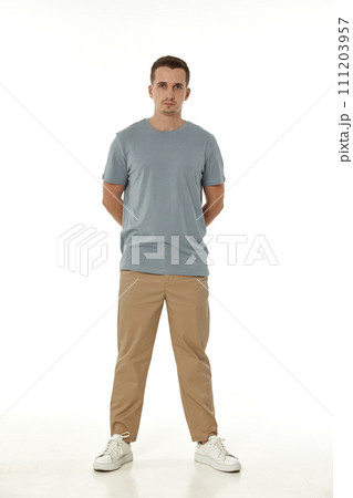 handsome young calm man on white background handsome young calm man on white background 111203957