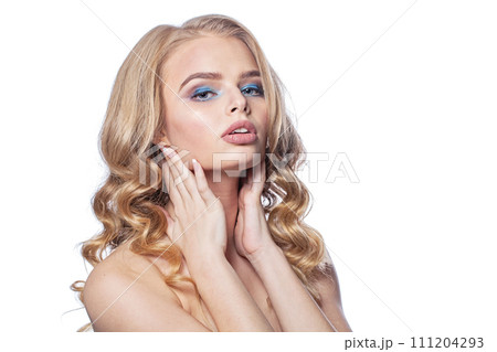 Beautiful healthy blonde model posing isolated on white background. Woman with make-up 111204293