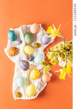 Naturally dyed Easter eggs on a napkin Naturally dyed Easter eggs on a napkin 111206549