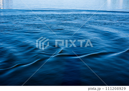 blue seawater texture. Blue seawater waves of sunlight. Top view. 111208929