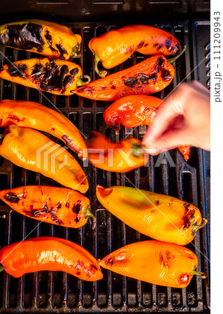 Red sweet kapia paprika on the grill 111209943