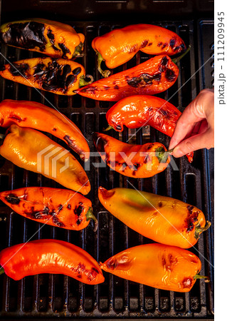 Red sweet kapia paprika on the grill Red sweet kapia paprika on the grill 111209945
